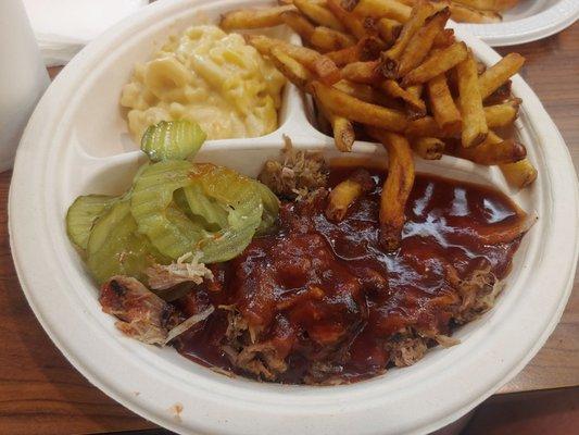 Pork plate with mac and cheese and fries.