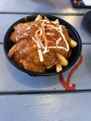 Poutine- butter chicken with fries