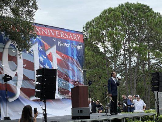 Lee Greenwood performs"Good Bless America" at the 20 anniversary event.