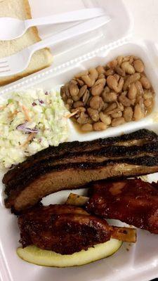 Sliced Brisket, Pig Ribs, Pinto Beans, and Coleslaw