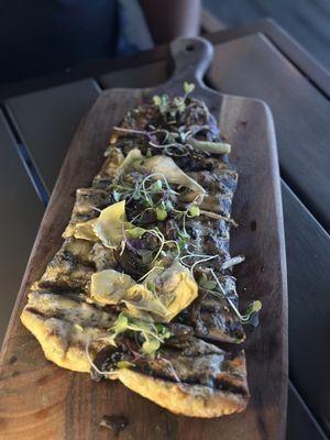 ROASTED RI MUSHROOM NAAN - Vermont cheddar mornay, truffle honey, artichoke hearts, pea tendrils