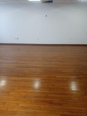 Wood floors before and after buffing.