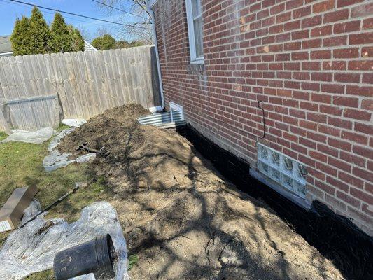 Exterior drainage with crack repairs