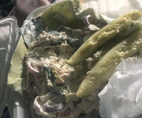 The inside of a chicken salad wrap with like a 1/2 jar of mayonnaise. The pickles were absolutely terrible.