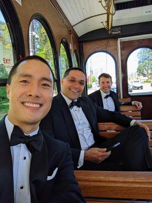 We chartered the 32-seat white trolley, The Swan, for our wedding. Riding down Peachtree Road to the Swan House, Atlanta History Center.