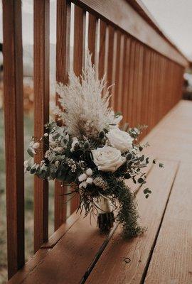 Simply elegant and boho beautiful,  this wedding bouquet is a stunner.