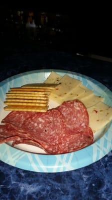 Salami and cheese of the house. Kinda justifies the price for a soda