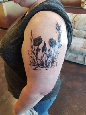 My mother's "death garden" tattoo as I call it. Done by Kennon.