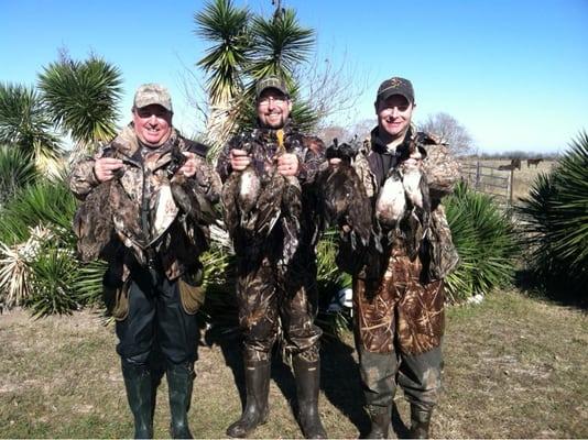 Three members in their duck regalia.