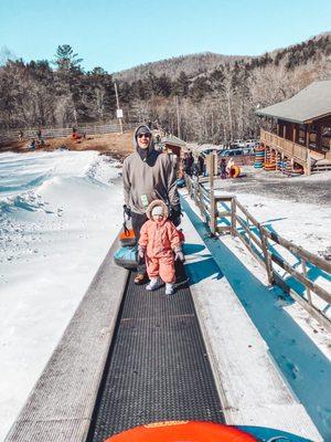 Moving sidewalk to get up to the tubing lanes.