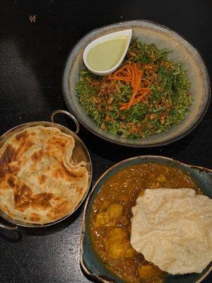 Main course with the side of Paratha. The Tamilian Chicken and the Paneer with Green Rice.