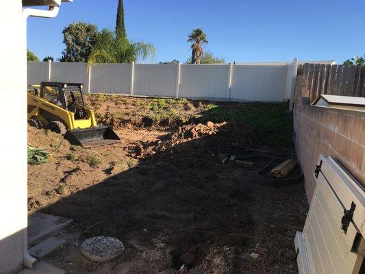 Mini-backhoe/bulldozer in our backyard!