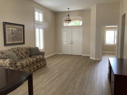 New luxury vinyl plank flooring and baseboards