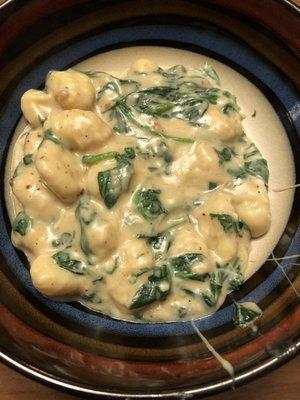 Gnocchi with a homemade cheesy spinach cream sauce