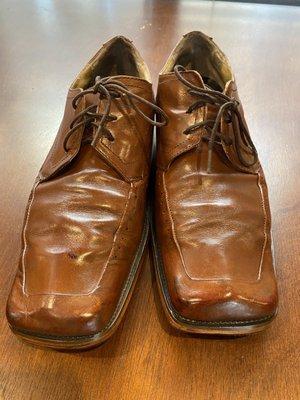 Some nice brown dress shoes that had the sole falling off. Jessy made them look so nice