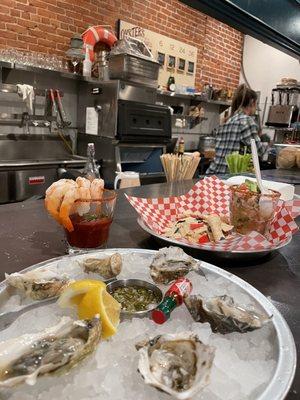 1/2 dozen oysters, shrimp cocktail and ceviche