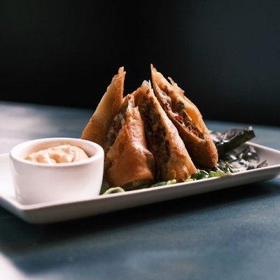 House made boudin sausage egg rolls