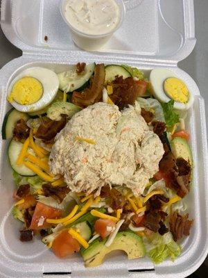 Club salad with a scoop of chicken salad