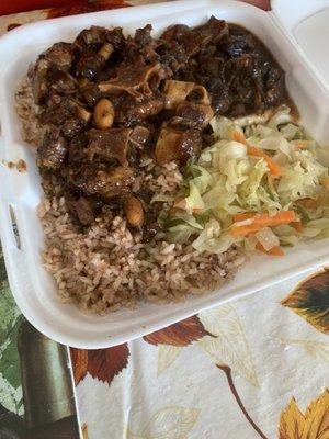 Oxtails rice and peas and cabbage