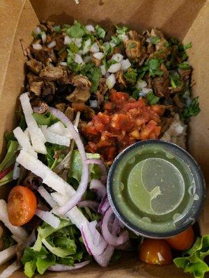 Falda Asada: grilled flank steak, salsa quemada and raw tomatillo salsa, chopped onion and cilantro