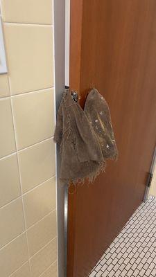 student got locked in bathroom- school broke lock off & used this as door handle