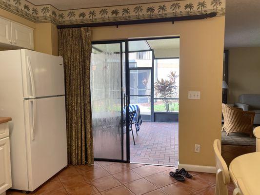 Kitchen sliding door to screened in patio