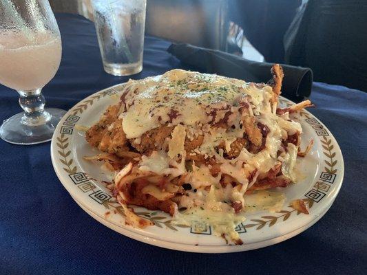 Chicken Parmesan all over Linguini noodles with marinara.