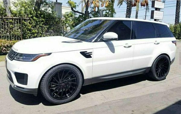 2018 Range Rover Sport with 22x10.5 Giovanna Spira wheels in classic gloss black and Hankook Ventus rubber.