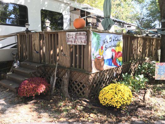 Mums, perennials and a seasonal pumpkin in my garden at the camper