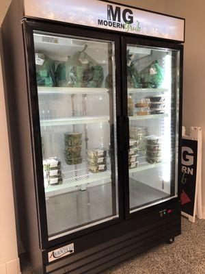 Fridge in lobby with salads for pick up