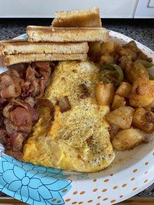 Cheddar cheese omelette, bacon, home fries and toast! Yumm! (Love Danny's breakfast)