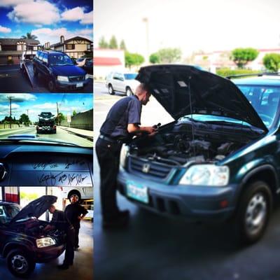 The amazing Dave working on my parents car! Getting in running faster then anyone could believe