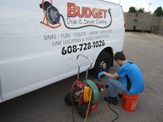 Rodding a main sewer lateral as preventive maintenance from a outside cleanout.