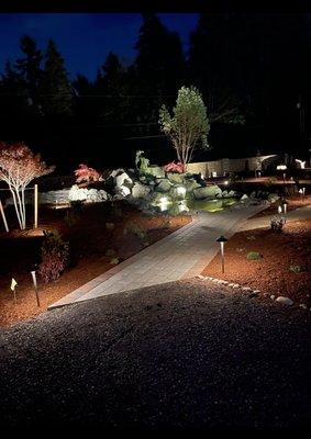 Landscaping and lighting by Evergreen Home Exteriors