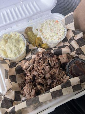 Memphis Style Pulled Pork Sandwich, potato salad and coleslaw