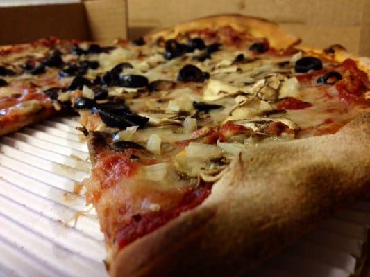 Pizza with onion, mushroom, black olive.