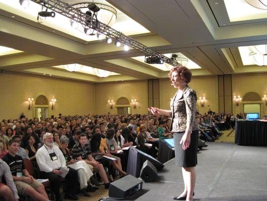 Susan Berkley on stage at one of her various public speaking events.