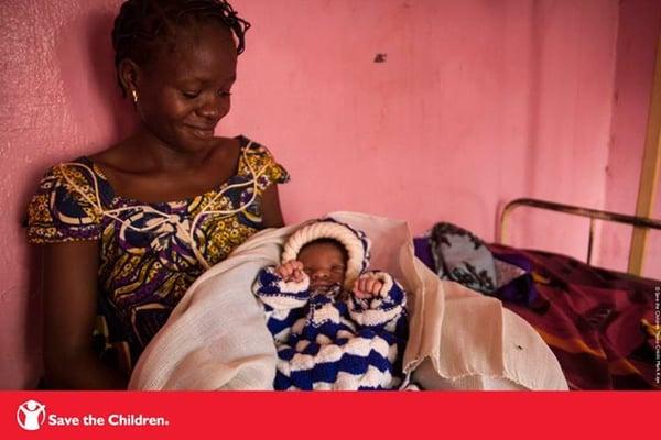 Vanessa, 20, holding her newborn baby boy at a hospital we support in Central African Republic.