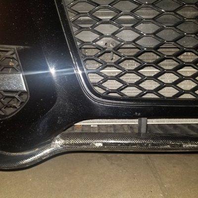 My cracked Carbon Fiber lip spoiler TNS Auto Group damaged.