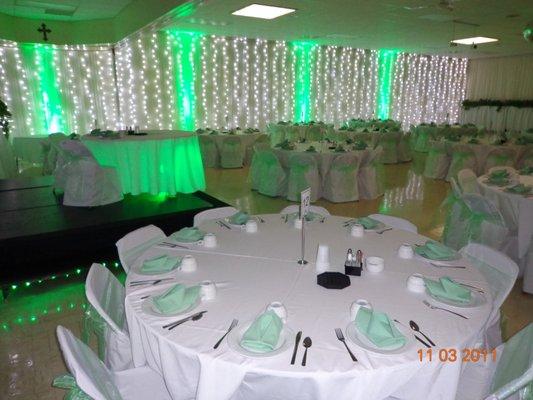 We can do 7 different up light colors all around the hall for $300.00