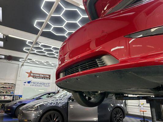 Many teslas getting our PPF, Tint and Ceramic coatings daily in our shop.