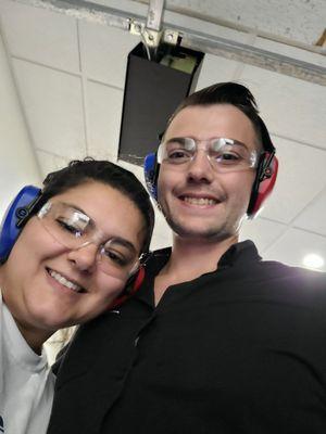 Husband and I in the range. Safety goggles & ear muffs were rented for under $15 total.