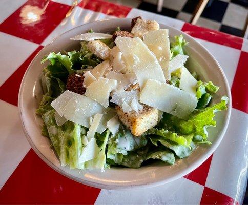 Caesar side salad that accompanies the meat lasagna lunch special