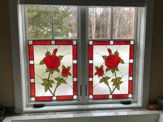 Custom rose window inserts for privacy over a hot tub