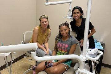 Happy patients at dental clinic in Houston, TX