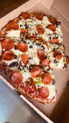 Sausage pepperoni black olives and green peppers