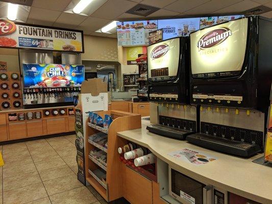 Inside the convenience store. Coffee selection. They also have a kitchen/grill.