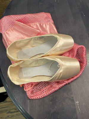 My pointe shoes before they were sewn with the bag I picked out to keep them in.