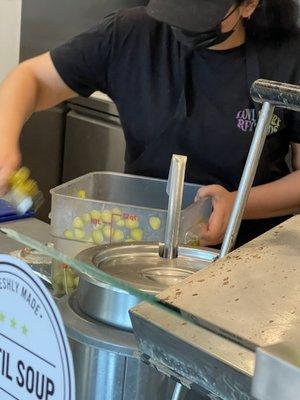 Employee handling food without gloves