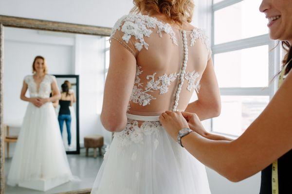 Tailored to perfection for your special day. Let us make your wedding gown fit like a dream. Book your alteration appointment today!